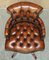 Antique Cigar Brown Leather Chesterfield Captain Armchair with Brass Castors 16