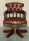 Antique Cigar Brown Leather Chesterfield Captain Armchair with Brass Castors 2