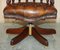 Antique Cigar Brown Leather Chesterfield Captain Armchair with Brass Castors 8