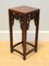 Small Chinese Brown Hardwood Plant Stand with Hand Carved Details 5