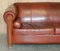 Vintage Art Nouveau Chestnut Brown Leather Club Sofa with Carved Wood Frame 3