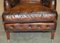 Bridgewater Brown Leather Armchairs & Footstool from Howard & Sons, 1880s, Set of 3, Image 8