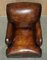 Bridgewater Brown Leather Armchairs & Footstool from Howard & Sons, 1880s, Set of 3 16