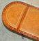 Vintage Hand Dyed and Aged Brown Leather Oval Coffee Table with Lion Castors 18