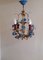 Small Chandelier with Gold-Colored Metal Frame in Colored Candle Filling and Blue Florets, 1970s 3