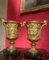 French 18th Century Louis XVI Ormolu Vases with Handles and Relief Putto on Black Belgian Marble Bases, Set of 2 2