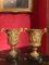 French 18th Century Louis XVI Ormolu Vases with Handles and Relief Putto on Black Belgian Marble Bases, Set of 2 18