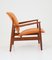 Model FD 136 Lounge Chair in Cognac Leather and Teak by Finn Juhl, 1970s 4