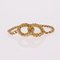 Moderner Ring aus 18 Karat Gelbgold mit Schlaufenkette 7