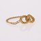 Moderner Ring aus 18 Karat Gelbgold mit Schlaufenkette 4