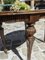 Niedriger Ovaler Tisch aus fein geschnitztem Nussholz, 1950er 4