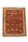 Tapis en laine mouton rouge et jaune 1