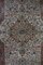Teppich mit buntem Muster und Quasten 5