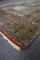 Teppich mit buntem Muster und Quasten 2