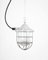 Lámpara colgante industrial de vidrio y hierro fundido, Polonia, años 50, Imagen 1