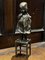 Figura in bronzo di una ragazza in piedi su una sedia, Immagine 2