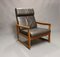Teak & Black Leather Rocking Chair by Ole Wanscher for Komfort, 1960s, Image 1