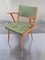Mid-Century Sessel mit Gestell aus gelbbrauner Buche & grünem Vinylbezug, 1960er 1
