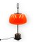 Tischlampe aus orangefarbenem Glas von Oscar Torlasco für Lumi, 1960er 17