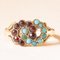 8 Karat Yellow Gold Infinity Ring with Turquoises and Garnets, Late 1800s-Early 1900s 1