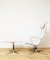 Poltrona EA124 girevole e poggiapiedi EA125 di Charles & Ray Eames per Herman Miller, anni '70, set di 2, Immagine 1