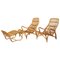 Swedish Modern Rattan Lounge Chairs and Footstool attributed to Bruno Mathsson for Dux, 1970s, Set of 3 1