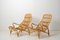 Swedish Modern Rattan Lounge Chairs and Footstool attributed to Bruno Mathsson for Dux, 1970s, Set of 3 3
