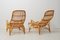 Swedish Modern Rattan Lounge Chairs and Footstool attributed to Bruno Mathsson for Dux, 1970s, Set of 3 5