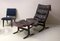 Mid-Century Patinated Black Leather Siesta Chair and Ottoman by Ingmar Relling, Set of 2 5