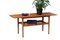 Danish Coffee Table in Teak with Wicker Magazine Shelf, 1960s 11