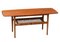 Danish Coffee Table in Teak with Wicker Magazine Shelf, 1960s 1