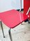 Mesa de comedor y sillas Mid-Century de formica roja, años 50. Juego de 3, Imagen 9