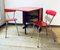 Mesa de comedor y sillas Mid-Century de formica roja, años 50. Juego de 3, Imagen 1