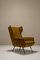 Italian Wingback Lounge Chair in Ocher and Metal, Italy, 1950s, Image 1