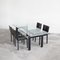 Mesa de comedor LC6 atribuida a Le Corbusier para Cassina y sillas de cuero negro de Matteo Grassi, años 90. Juego de 5, Imagen 3