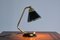 Lampada da tavolo vintage in ottone e metallo nero di Erik Wärnå, anni '50, Immagine 10