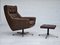 Danish Swivel Chair with Footstool in Leather, 1970s, Set of 2, Image 1