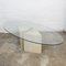 Mesa de centro ovalada con superficie de vidrio sobre travertino y base de latón, años 80, Imagen 4