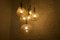 Kaskadenlampe aus Messing mit Bernsteinfarbenen Kugelschirmen, 1950er 5