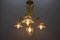 French Louis XVI Style Bronze and Clear Cut Glass Four-Light Chandelier, 1920s 2