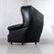Wingback Chair in Black Leather on Wheels, 1960s 16