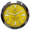 Reloj de pared con cronómetro y bisel estriado con esfera amarilla luminosa de Breitling, Imagen 1