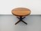 Scandinavian Extendable Round Table in Teak and Walnut, 1960s 17