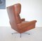 Vintage Danish Swivel Chair and Footstool in Cognac Leather from Skipper, 1964, Set of 2 2