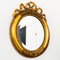 Barocker Spiegel aus Brocante mit Schleife in Gold 1