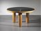 Skulpturaler runder Tisch aus Holz, Messing & dunklem Laminat, Italien 1970er 2