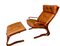 Vintage Scandinavian Cognac Lounge Chair and Foot Stool by Oddvin Rykken, 1960s, Set of 2 1