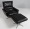 Drehbarer Sessel mit Fußhocker aus schwarzem Leder von Georg Thams, 1960er, 2er Set 2