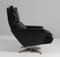 Drehbarer Sessel mit Fußhocker aus schwarzem Leder von Georg Thams, 1960er, 2er Set 9