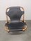 Vintage Relaxation Armchair in Rattan with Black Leather Seat, 1960s 10